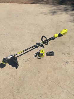 RYOBI ONE+ HP 18V Brushless 15 in. Attachment Capable String Trimmer with 6.0 Ah Battery and Charger