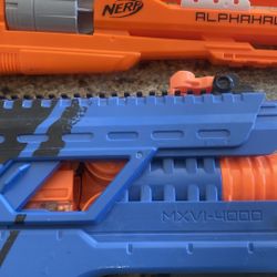 Various Nerf Guns With Bullets