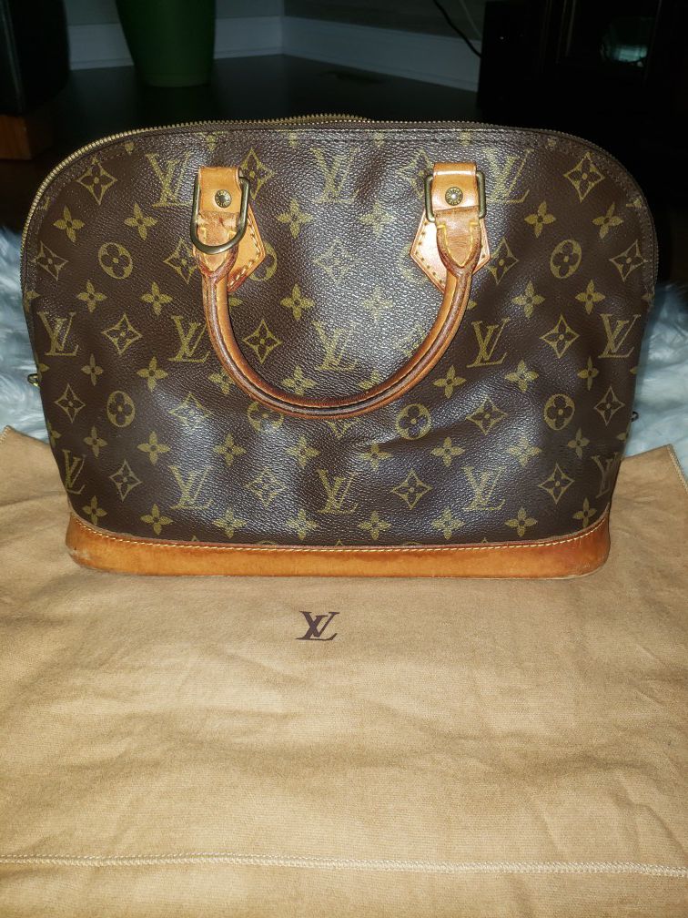 Authentic Louis Vuitton Alma hand bag