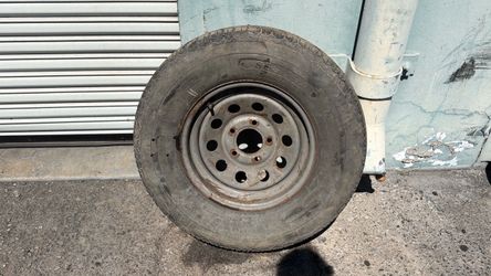 One 15 Inch steel Wheel and Old Tire 5x5 Lug Fits Chevy Or gmc Truck or Van, Or or trailer