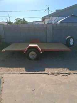 Flatbed trailor 6'x 12' new wood floor  3500lbs payload 2" ball  Newer tires 14" spare tire  title and permanent plate