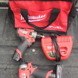 Milwaukee Fuel With Hammer Drill And Impact 2 Batteries Charger And Bag M12