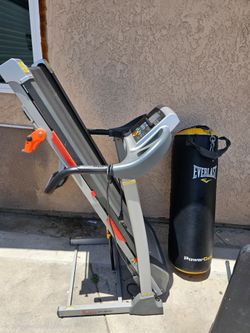 Sunny treadmill and everlast punching bag
