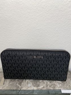 Mk large black monogram with silver hardware. 100% authentic