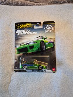 Fast and furious green Mitsubishi eclipse chase car