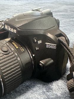 Nikon D3400 24.2MP Digital SLR Camera With AF-P 18-55mm f/3.5-5.6G VR Lens + Bag + 2 Battery + SD card