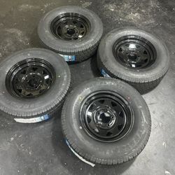 New Set Of 4 St205/75r14 Trailer Wheels. 