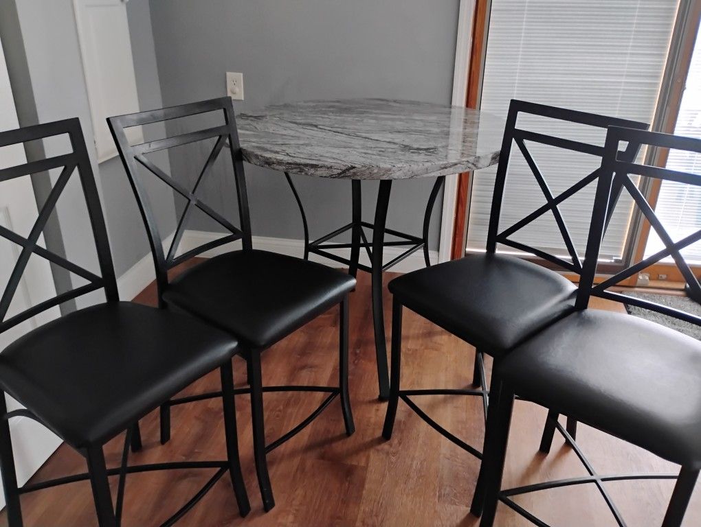 1 Table And 4 Chairs