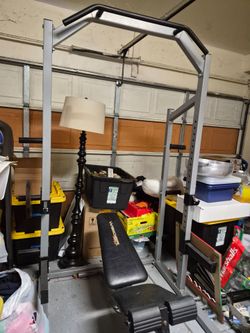 Bench press with a pull up bar and weights