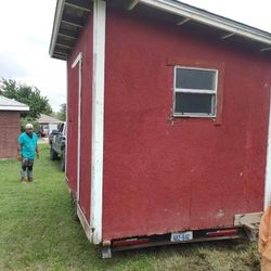 wood storage shed as is