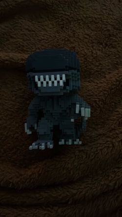 Funko POP! 8-Bit Alien Xenomorph #24 vinyl figure.