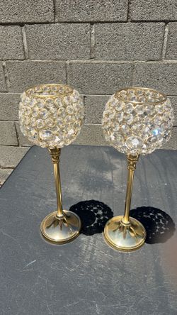 Two gold candle holders