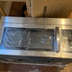New   Whirlpool Microwave  Hood Combination