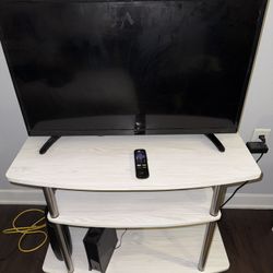 Roku 32 Inch Smart TV And TV Stand 
