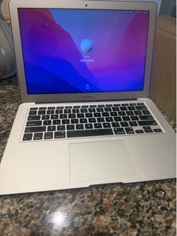 Silver MacBook Air With Charger