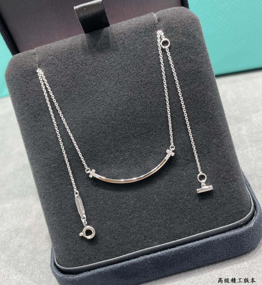 Tiffany smiley face necklace with diamonds on both sides