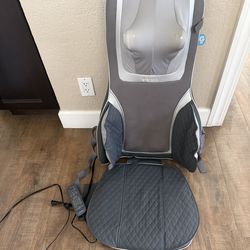 Heating and massaging office chair pad