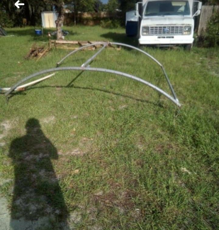 Carport with brand new tarp.