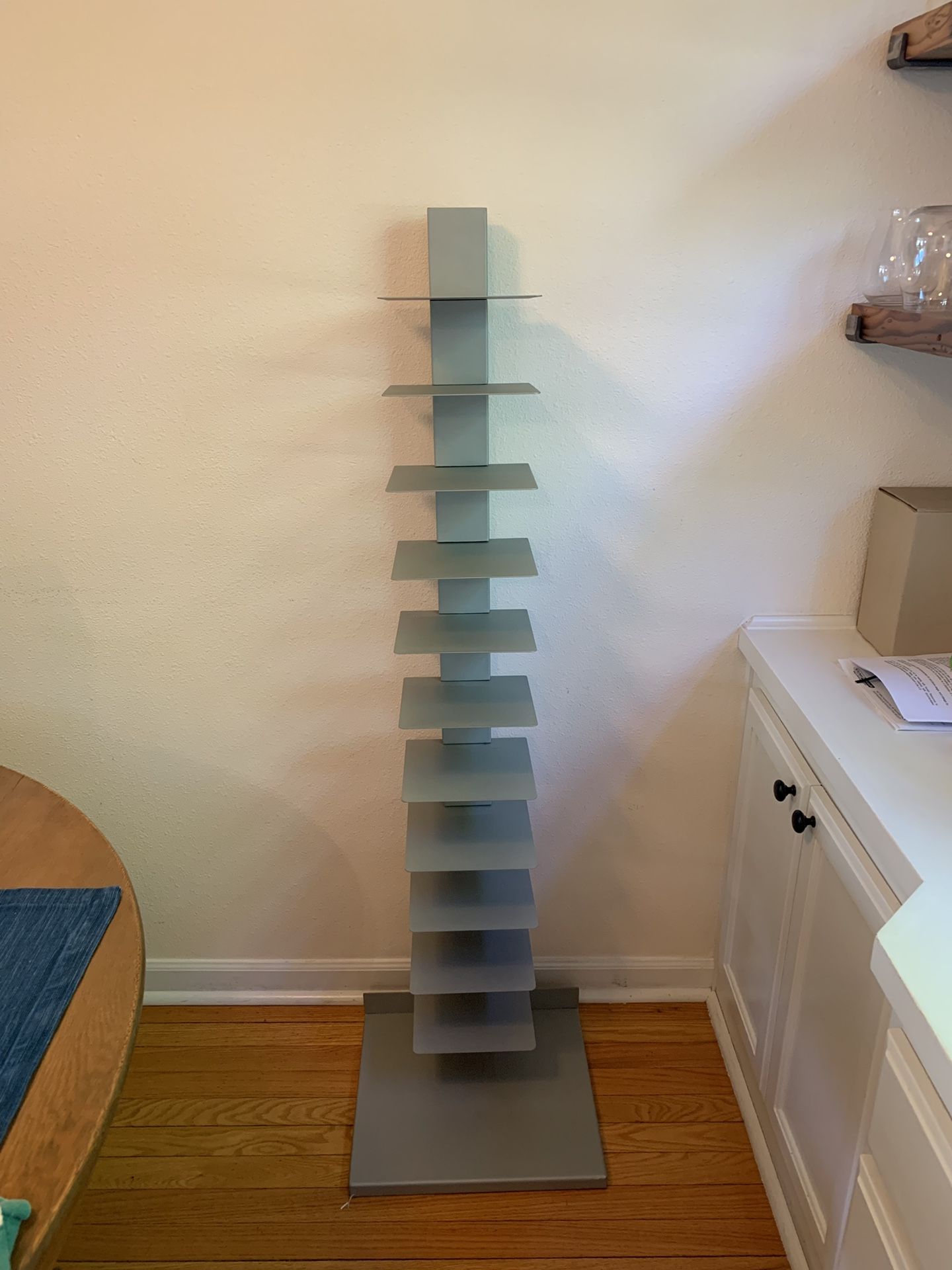 Grey vertical book shelf