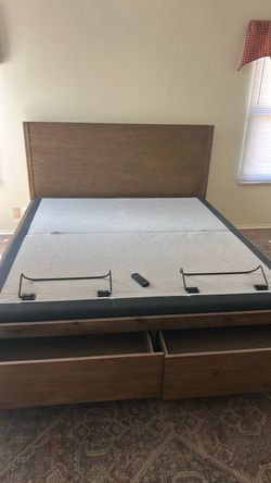 bedframe with two storage drawers. Includes platform that raises at the head and feet with remote. Cal king bedframe with two storage drawers. Include