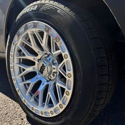 17x9 XM Rims And Tires 235/55/17 Ferentino 