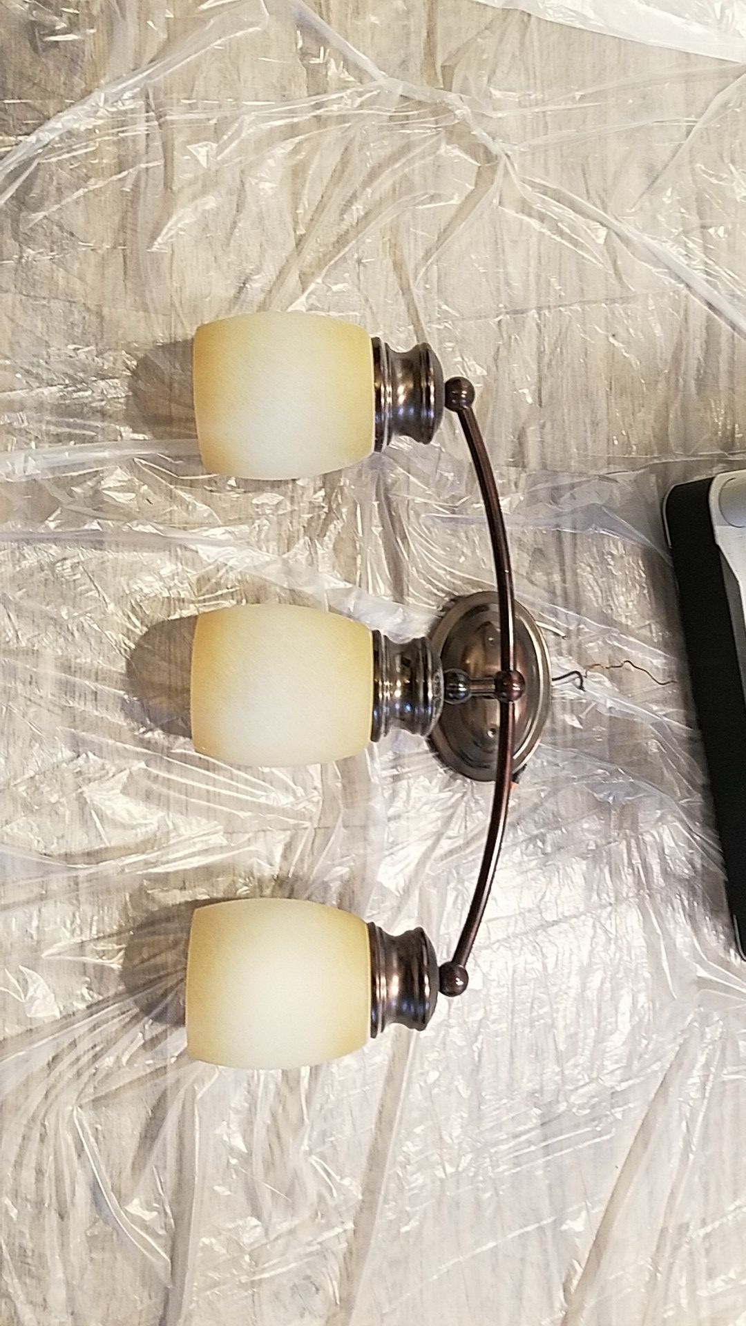 Light fixture perfect shape. Wife wanted to change style.