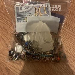 Bag Of Jewelry And Charms