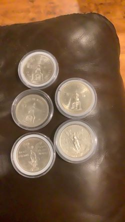 Onza y Dos pesos $200. 00 cada ina
