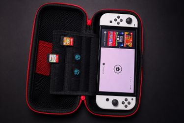 Nintendo Switch OLED White Bundle + Zelda + Smash Bros + Carrying Case