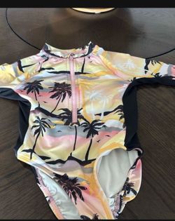 Girls Swimming dress new  size 6-7 only