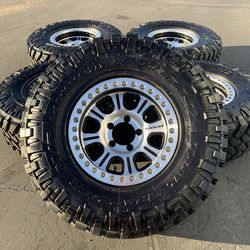 (5) Jeep Wrangler TJ REAL Raceline Beadlock Wheels and 35” Nitto Mud-Terrain Tires