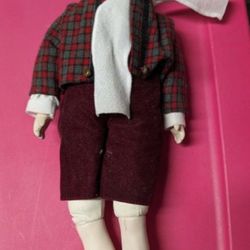 Vintage Anco Porcelain Boy Doll in Winter outfit.