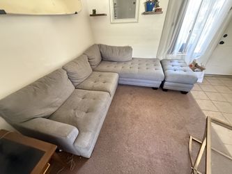 Gray sectional sofa with chaise