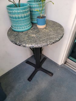 Granite  or Marble - Not Sure.   LOL