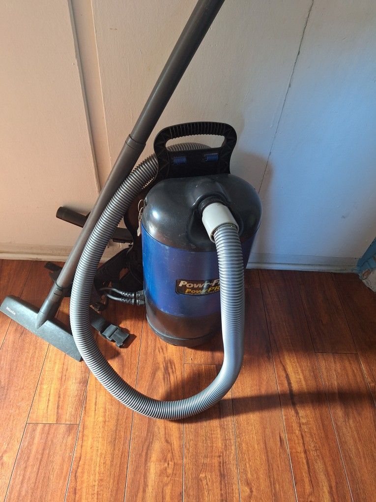 Power = Flite. Backpack Vacuum