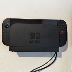 Nintendo switch 2 plus 2 games