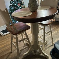 Tall Round Table With Barstools That Swirls