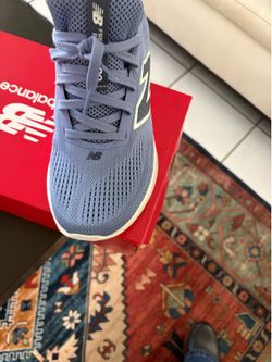 Blue New Balance woman