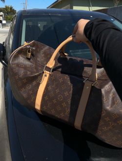 Luis Vuitton Duffle Bag