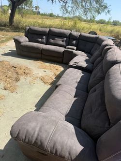 Charcoal gray sectional  with coffee table
