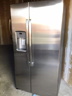 GE Side by Side Refrigerator (semi new)