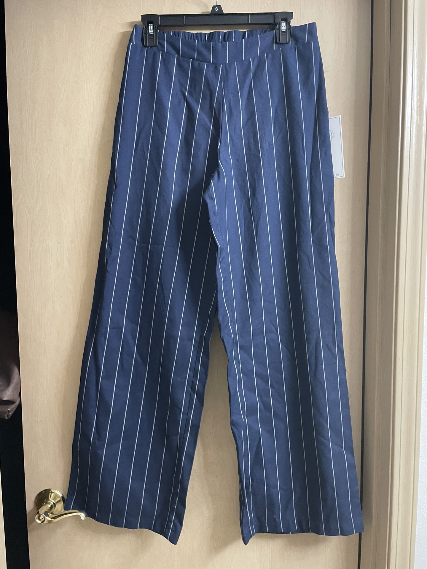 Brand New size Medium Women’s Navy Blue pin striped wide leg pant.