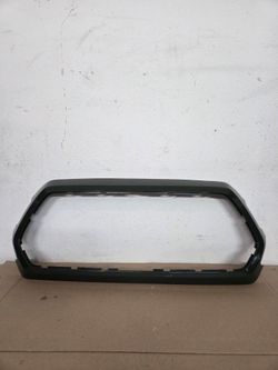 2016-2023 Toyota Tacoma Grille outer trim OEM