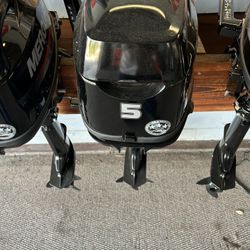 Small Mercury tiller handle outboards