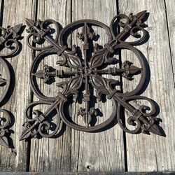 2 Early American Cast Iron Fleur De Lis