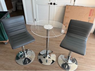 Adjustable height table and chairs
