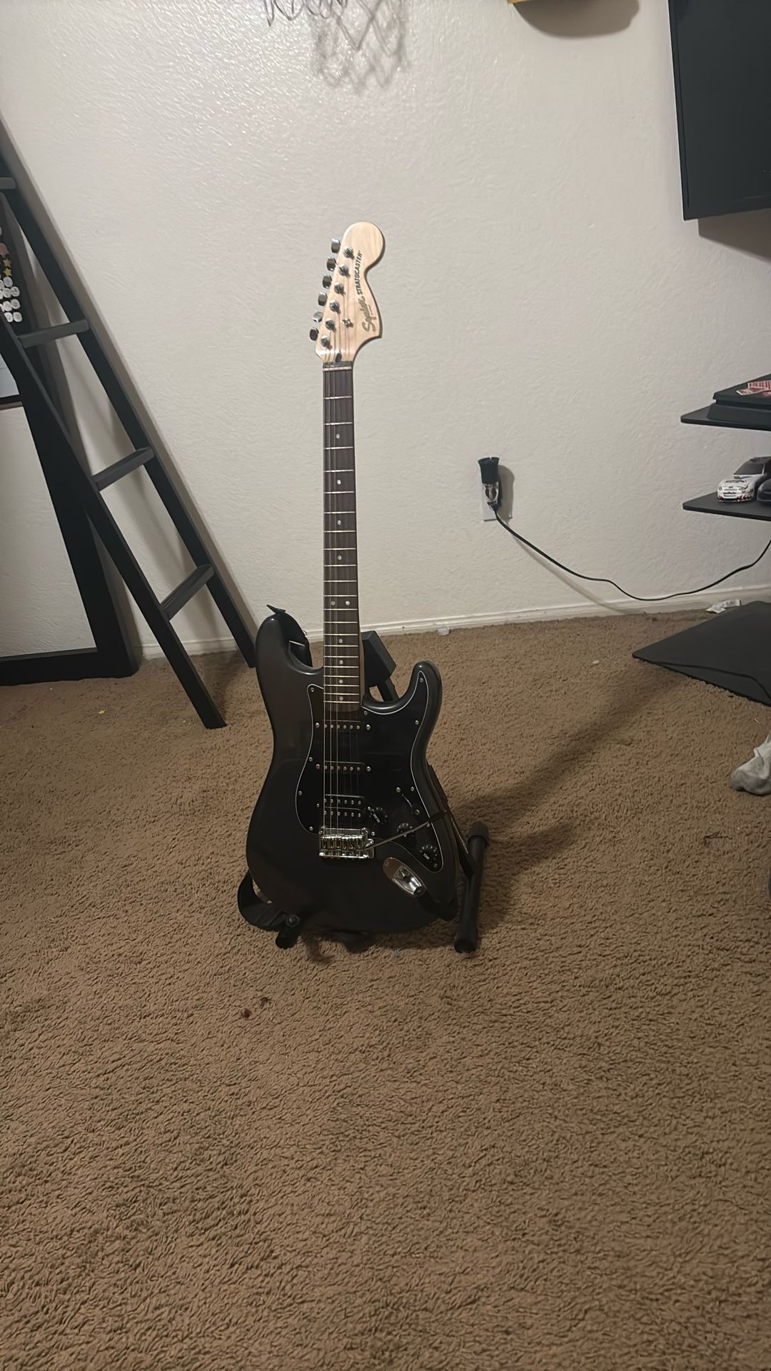 Black Fender Squier Stratacoaster Electric Guitar (With Strap) with Adjustable Guitar Stand