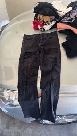 Men’s lack ripped jeans