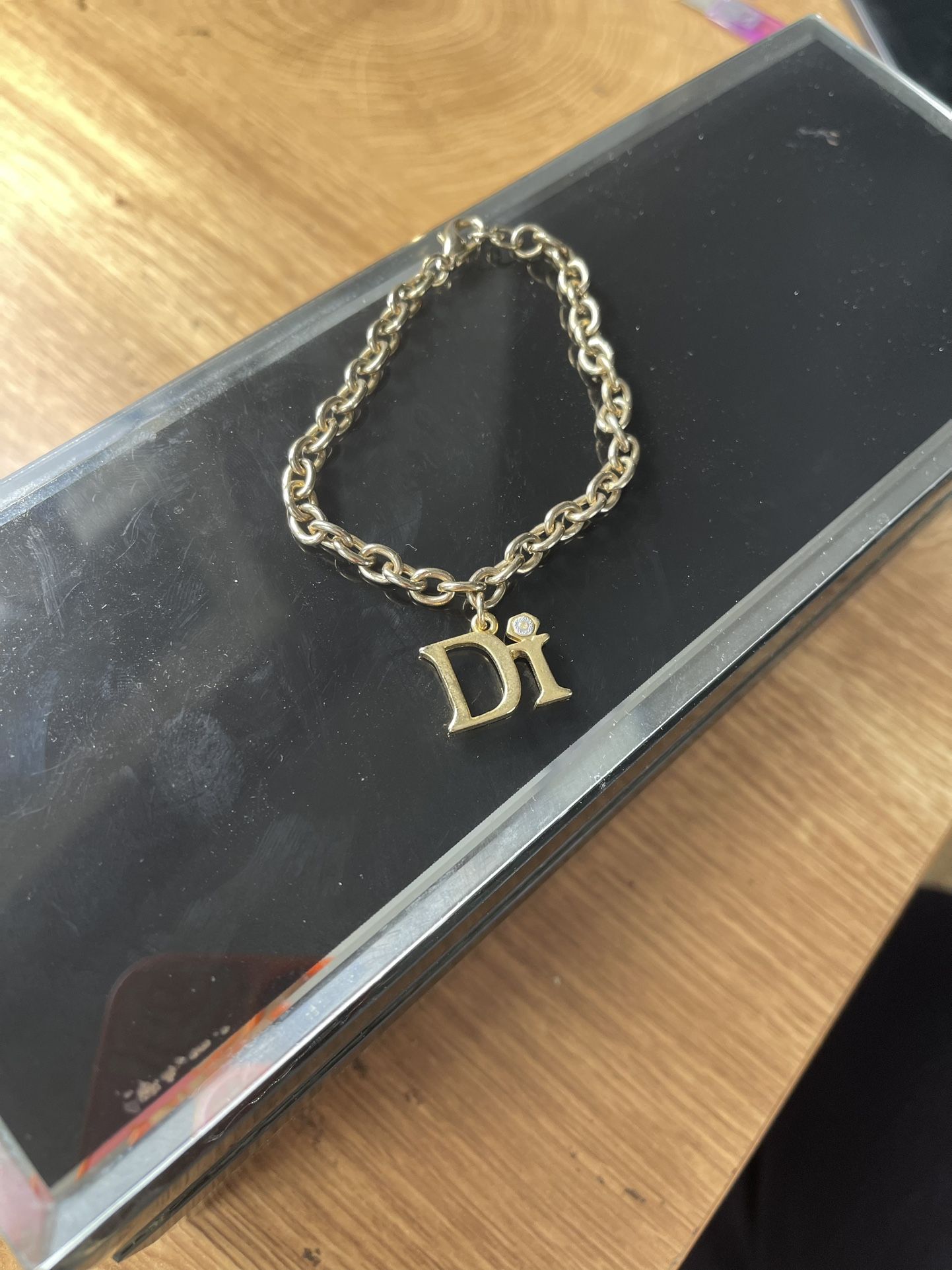 Di