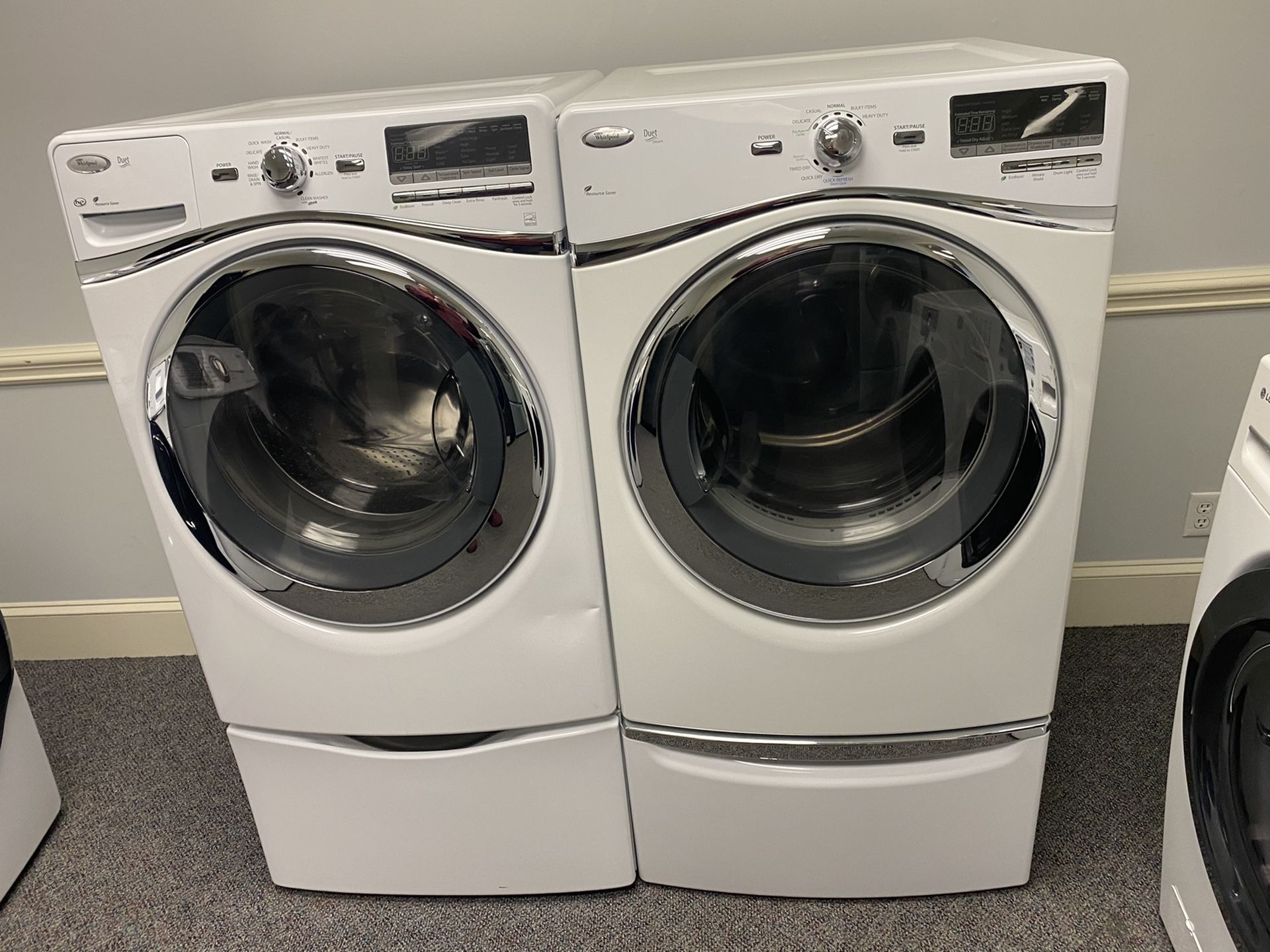 Whirlpool DUET STEAM HIGH EFFICIENCY FRONT LOAD WASHER AND DRYER SET ON PEDESTALS 4 MONTH WARRANTY